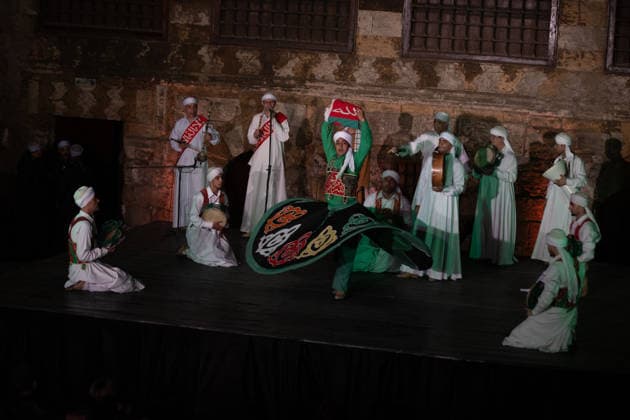 The traditional Ramadan custom Tennura dance in Egypt CAIRO, EGYPT - FEBRUARY 25: Tennura dance performances and Sufi music concerts are held daily throughout the holy month of Ramadan at Bayt al-Ghuri in Cairo on February 25, 2026. Wearing colorful skirts, embroidered vests, and white caps, Tennura performers spin around their axis while playing tambourines in rhythm with Sufi music, creating a vibrant and spiritual spectacle. Fareed Kotb Anadolu Cairo Egypt. Editorial use only. Please get in touch for any other usage.  Copyright: x2026xAnadoluxFareedxKotbx