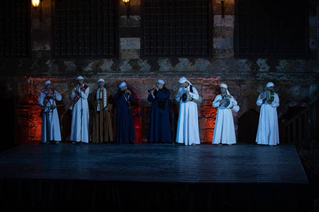 The traditional Ramadan custom Tennura dance in Egypt CAIRO, EGYPT - FEBRUARY 25: Tennura dance performances and Sufi music concerts are held daily throughout the holy month of Ramadan at Bayt al-Ghuri in Cairo on February 25, 2026. Wearing colorful skirts, embroidered vests, and white caps, Tennura performers spin around their axis while playing tambourines in rhythm with Sufi music, creating a vibrant and spiritual spectacle. Fareed Kotb Anadolu Cairo Egypt. Editorial use only. Please get in touch for any other usage.  Copyright: x2026xAnadoluxFareedxKotbx