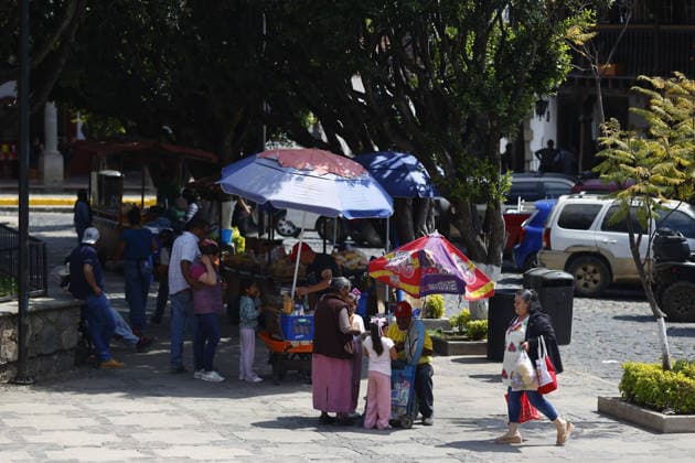 Life in Tapalpa after military operation that killed cartel leader El Mencho TAPALPA, MEXICO - FEBRUARY 25: People walk through the streets of the Tapalpa town center after a military operation that killed cartel leader Nemesio Oseguera, El Mencho , in Tapalpa, Mexico. on February 25, 2026. Stringer Anadolu Tapalpa Mexico. Editorial use only. Please get in touch for any other usage.  Copyright: x2026xAnadoluxStringerx