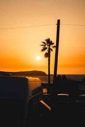 Coastal sunset with palm silhouette in Galicia A stunning coastal sunset in Galicia, Spain, captured with the silhouette of a palm tree against the vibrant orange sky, creating a serene and picturesque scene. Model Released AlvaroMontero_ID33214_1131224_002 Copyright: xAlvaroxMonterox RECORD DATE NOT STATED