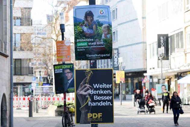 Wahlplakate der Tierschutzpartei und der Partei des Fortschritts PDF sind an einem Laternenmast befestigt, Landtag und Wahlwerbung, Landtagswahl in Baden Wuerttemberg 2026, Innenstadt am 26. February 2026 in Stuttgart, Deutschland. (Foto von Marco Steinbrenner DeFodi Images) Election posters for the Animal Protection Party and the Party of Progress PDF are attached to a lamppost, Landtag und Wahlwerbung, Landtagswahl in Baden Wuerttemberg 2026, City centre, February 26, 2026 in Stuttgart, Germany. (Photo by Marco Steinbrenner DeFodi Images)