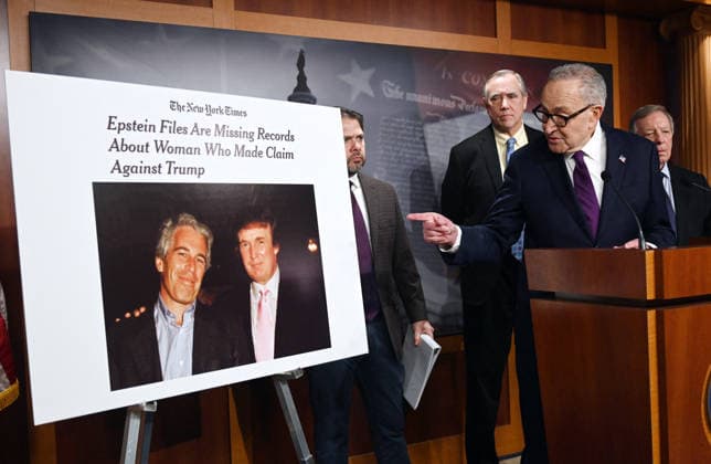 News Themen der Woche KW09 US Senate Minority Leader Chuck Schumer press conference to announce oversight efforts on the files of convicted sex offender Jeffrey Epstein A sign showing a photo of US President Donald Trump and Jeffrey Epstein is displayed as US Senate Minority Leader Chuck Schumer, Democrat of New York speaks during a press conference to announce oversight efforts on the files of convicted sex offender Jeffrey Epstein, at the US Capitol in Washington, DC, on February 26, 2026. Photo by Olivier Douliery ABACAPRESS.COM Washington DC United States  Copyright: xDoulieryxOlivier ABACAx