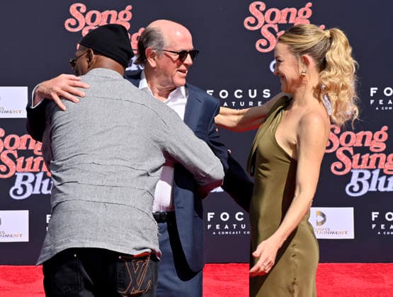 US actors Samuel L. Jackson (L) and Kate Hudson (R) participates in a hand and footprint ceremony immortalizing producer John Davis (C) in the forecourt of the TCL Chinese Theatre (formerly Grauman s) in the Hollywood section of Los Angeles on Thursday, February 26, 2026.  LAP2026022607 JIMxRUYMEN