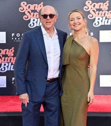 US actress Kate Hudson (R) participates in a hand and footprint ceremony immortalizing producer John Davis (L) in the forecourt of the TCL Chinese Theatre (formerly Grauman s) in the Hollywood section of Los Angeles on Thursday, February 26, 2026.  LAP2026022609 JIMxRUYMEN