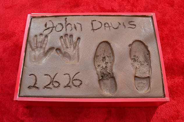 Producer John Davis hand and footprints are on display following a ceremony immortalizing him in the forecourt of the TCL Chinese Theatre (formerly Grauman s) in the Hollywood section of Los Angeles on Thursday, February 26, 2026.  LAP2026022613 JIMxRUYMEN