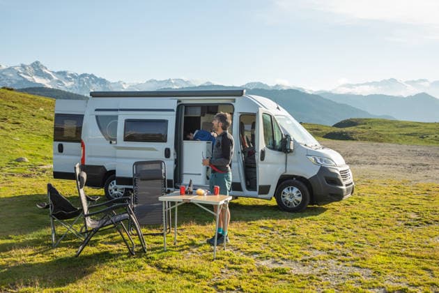 Camper van adventure in the scenic Pyrenees region A couple enjoys a serene camper van adventure amidst the breathtaking landscapes of the Pyrenees. The picturesque setting provides a perfect escape into nature s beauty. Model Released Robcabphotography_ID32893_1119988_002 Copyright: xRobcabphotographyx RECORD DATE NOT STATED