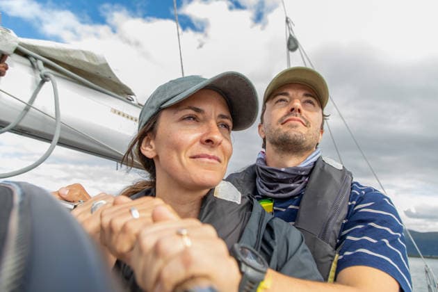 Lifestyle of a couple sailing in beautiful Norway A couple enjoys a serene day on their boat, surrounded by Norway stunning landscapes. They embrace the peacefulness and adventure of a nautical lifestyle together. Model Released Robcabphotography_ID33004_1123715_003 Copyright: xRobcabphotographyx RECORD DATE NOT STATED