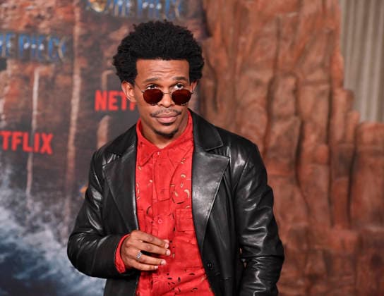 Cast member Camrus Johnson attends Netflix s One Piece: Into the Grand Line Season 2 fan event at the United Theater On Broadway in downtown Los Angeles on Thursday, February 26, 2026. Storyline: Follows Monkey D. Luffy and his Straw Hat Pirates as they explore the dangerous Grand Line to find the legendary One Piece treasure and become the Pirate King. The story emphasizes friendship, adventure, and overcoming immense, often dark hardships in a world controlled by a corrupt government.  LAP20260226832 JIMxRUYMEN