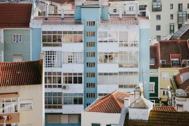 Lisbon colorful residential architecture A view of Lisbon s residential buildings showcasing a mix of pastel colors and classic architecture. The warm sunlight highlights the charm of Portugal s urban design. Model Released VictorTorres_ID34247_1235947_050 Copyright: xVictorxTorresx