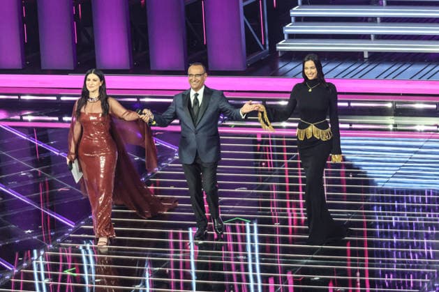 Live Music Show - 76Â° Festival di Sanremo 2026 - 3^ Serata CARLO CONTI IRINA SHAYK LUKE on stage during the third night of the Festival Sanremo during 76Â° Festival di Sanremo 2026 - 3^ Serata , Live Music Show in Sanremo, Italy, February 27 2026 Sanremo Sanremo Italy Copyright: xRenataxRoattinox xLiveMediax LPM_2317811
