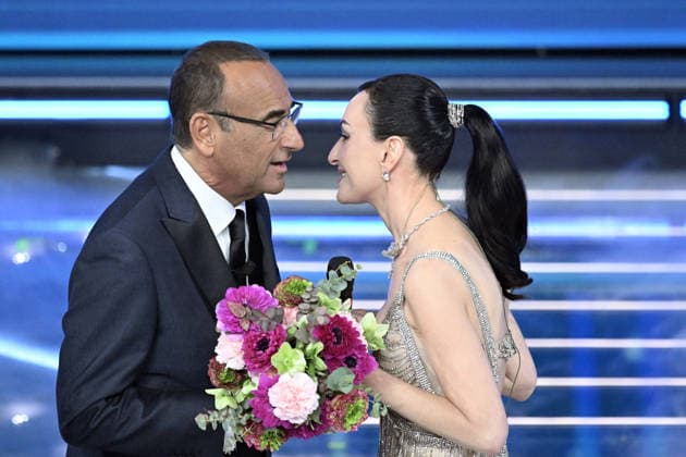 February 27, 2026, Sanremo, Rome, Italy: February 26, 2026, Sanremo. 76th Italian Song Festival. Third Night. Pictured: Carlo Conti, Arisa Sanremo Italy  - ZUMAa289 20260227_zia_a289_135 Copyright: xMariaxLauraxAntonellix