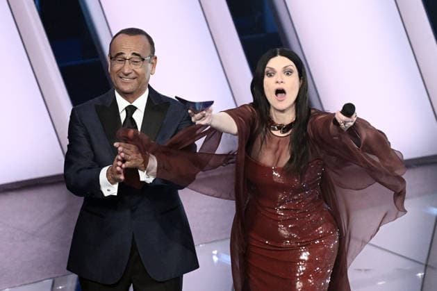 February 27, 2026, Sanremo, Rome, Italy: February 26, 2026, Sanremo. 76th Italian Song Festival. Third Night. Pictured: Carlo Conti and Laura Pausini. Sanremo Italy  - ZUMAa289 20260227_zia_a289_141 Copyright: xMariaxLauraxAntonellix