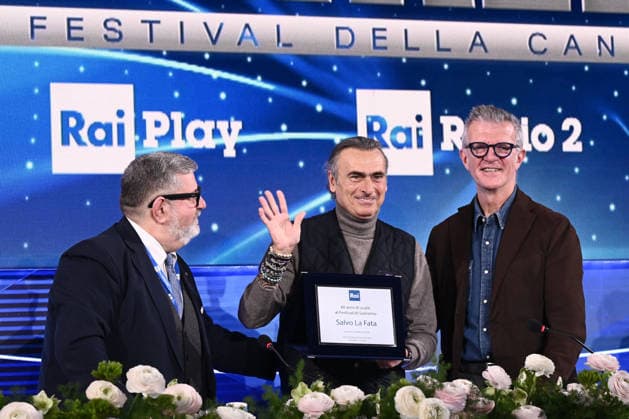 February 27, 2026, Sanremo, Rome, Italy: February 27, 2026, Sanremo. 76th Italian Song Festival. Photocall. The award photo for 40 years of photography at the Festival goes to photographer Salvo La Fata with Fabrizio Casinelli and Claudio Fasulo. Sanremo Italy  - ZUMAa289 20260227_zia_a289_173 Copyright: xMariaxLauraxAntonellix