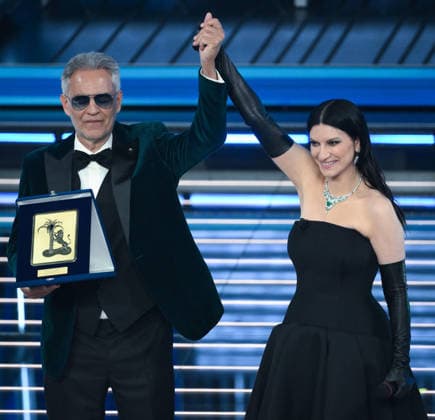 February 28, 2026, Sanremo, ITALY: (L-R) Italian tenor Andrea Bocelli and Italian singer Laura Pausini on stage at the Ariston theatre during the 76th edition of the Sanremo Italian Song Festival, in Sanremo, Italy, 28 February 2026. The Music Festival runs from 24 to 28 February 2026. ANSA ETTORE FERRARI Sanremo ITALY  - ZUMAa110 20260228_zaf_a110_231 Copyright: xEttorexFerrarix