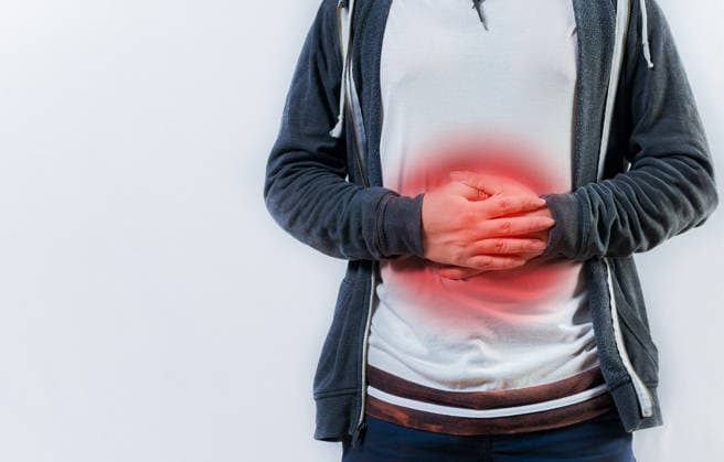 Person mit Verdauungs- und Magenproblemen isoliert. Unglücklicher Mann mit Verdauungsproblemen isoliert Person with digestive and stomach problems isolated. Unhappy man with digestive problems isolated (License=RF) ,model released, Symbolfoto Copyright: xZoonar.com IsaixHERNANDEZx 24712055 ,model released, Symbolfoto ,property released