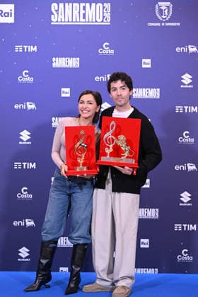 March 1, 2026, Sanremo, Rome, Italia: Fulminacci (R) poses with the Mia Martini Critics award, and Italian singer Serena Brancale (L) poses with the Sala Stampa Lucio Dalla award during a photocall at the 76th Sanremo Italian Song Festival, Sanremo, Italy, 01 March 2026. The 76th Sanremo Italian Song Festival started on 24 February and concluded on the evening of 28 February 2026.....1 Mar 2026 Sanremo Italia  - ZUMAa289 20260301_zia_a289_294 Copyright: xMariaxLauraxAntonellix