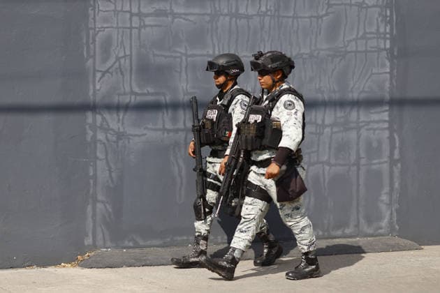 Funeral preparations are underway, believed to be for the slain cartel leader El Mencho in Guadalajara GUADALAJARA, MEXICO - MARCH 1: Mexican Army members take security measures near the La Paz funeral home, where the body of Nemesio Oseguera Cervantes, the leader of the Jalisco New Generation Cartel (CJNG) known as El Mencho , is believed to be located in Guadalajara, Jalisco, Mexico, on March 1, 2026. Stringer Anadolu Guadalajara Mexico. Editorial use only. Please get in touch for any other usage.  Copyright: x2026xAnadoluxStringerx
