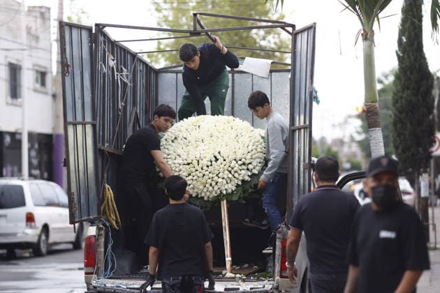 Funeral preparations are underway, believed to be for the slain cartel leader El Mencho in Guadalajara GUADALAJARA, MEXICO - MARCH 1: Employees unload a floral arrangement outside the La Paz funeral home as Mexican Army members take security measures near the funeral home, where the body of Nemesio Oseguera Cervantes, the leader of the Jalisco New Generation Cartel (CJNG) known as El Mencho , is believed to be located in Guadalajara, Jalisco, Mexico, on March 1, 2026. Stringer Anadolu Guadalajara Mexico. Editorial use only. Please get in touch for any other usage.  Copyright: x2026xAnadoluxStringerx