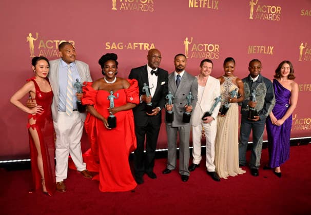 Li Jun Li, Omar Benson Miller, Wunmi Mosaku, Delroy Lindo, Michael B. Jordan, Jack O Connell, Jayme Lawson, Miles Caton, and Lola Kirke, winners of the Outstanding Performance by a Cast in a Motion Picture Award for Sinners, appear backstage during the 32nd annual SAG Awards held at the Shrine Auditorium in Los Angeles on Sunday, March 1, 2026. LAP20260301148 JIMxRUYMEN