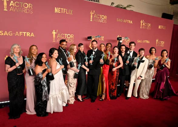 Joanna Going, Krystel V. McNeil, Tracy Vilar, Kristin Villanueva, Brandon Mendez Homer, Taylor Dearden, Fiona Dourif, Noah Wyle, Alexandra Metz, Tracy Ifeachor, Isa Briones, Jalen Thomas Brooks, Patrick Ball, Gerran Howell, Supriya Ganesh and Amielynn Abellera, winners of the Outstanding Performance by an Ensemble in a Drama Series award for The Pitt, appear backstage during the 32nd annual SAG Awards held at the Shrine Auditorium in Los Angeles on Sunday, March 1, 2026. LAP20260301169 JIMxRUYMEN