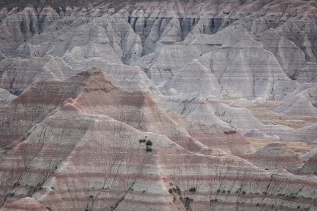 Badland Layered Rocks in Badlands National Park Rapid City, South Dakota, United States CR_NCJL260301C-1976202-01
