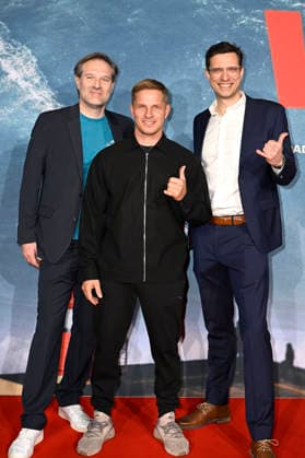 Peter Wolf, Sebastian Steudtner und Axel Gerdau bei der Weltpremiere des Dokumentarfilms On The Wave im Cinedom. Köln, 02.03.2026
