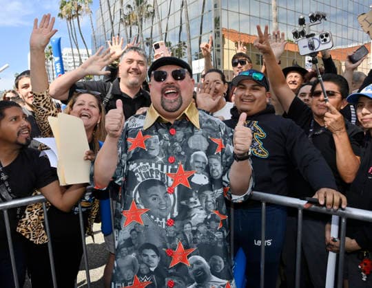 Comedian Gabriel Fluffy Iglesias poses with fans during an unveiling ceremony honoring him with the 2,838th star on the Hollywood Walk of Fame in Los Angeles on Tuesday, March 3, 2026.  LAP2026030301 JIMxRUYMEN