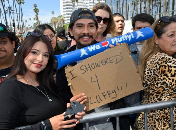 A fan holds a sign during comedian Gabriel Fluffy Iglesias unveiling ceremony honoring him with the 2,838th star on the Hollywood Walk of Fame in Los Angeles on Tuesday, March 3, 2026.  LAP2026030303 JIMxRUYMEN