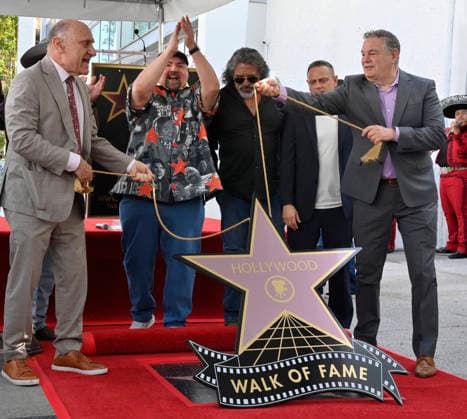 Comedian Gabriel Fluffy Iglesias (R) reacts during an unveiling ceremony honoring him with the 2,838th star on the Hollywood Walk of Fame in Los Angeles on Tuesday, March 3, 2026.  LAP2026030313 JIMxRUYMEN