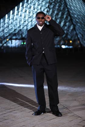 PFW Le Grand Diner du Louvre Arrivals Photocall Tiakola attending the Le Grand Diner du Louvre Arrivals Photocall at the Musee du Louvre as part of Paris Fashion Week on March 03, 2026 in Paris, France. Photo by Jerome Dominé ABACAPRESS.COM Paris France  Copyright: xDominexJerome ABACAx