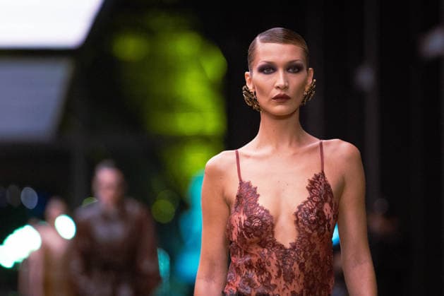 PFW - Bella Hadid Models For Saint Laurent US model Bella Hadid presents a creation for Saint Laurent for the Women s Ready to Wear Fall Winter 2026-2027 collection fashion show as part of the Paris Women Fashion Week (PFW), in Paris, on March 3, 2026. Photo by Alexis Jumeau ABACAPRESS.COM Paris France  Copyright: xJumeauxAlexis ABACAx