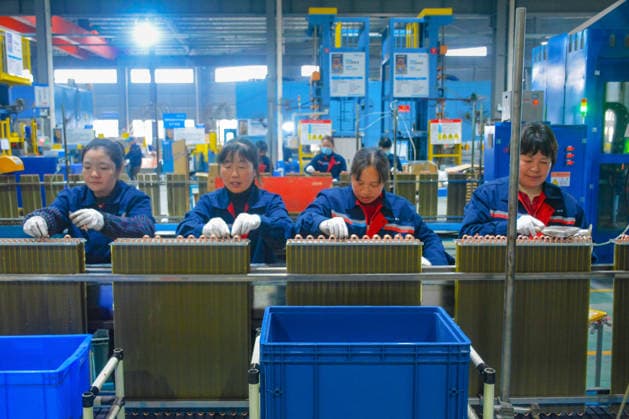 ANQING, CHINA - FEBRUARY 26: Workers produce air conditioning heat exchangers at Anhui Meibo New Energy Technology Co., Ltd. after the Spring Festival holiday on February 26, 2026 in Anqing, Anhui Province of China.  Copyright: xVCGx 111624041870