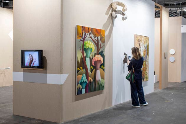 March 4, 2026, Madrid, Madrid, Spain: A woman takes a photograph of a work of art with her cell phone during the opening of ARCO (Spain s International Contemporary Art Fair) at its 45th edition at the IFEMA exhibition center in Madrid. Madrid Spain  - ZUMAs296 20260304_znp_s296_005 Copyright: xLuisxSotox