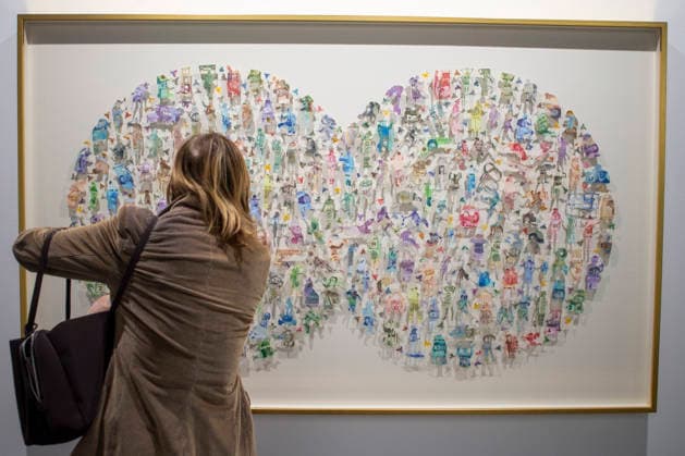 March 4, 2026, Madrid, Madrid, Spain: A woman observes the artwork Face to Face with Death III by artist Carlos Aires, made with banknotes from the world s richest countries, during the opening of ARCO (Spain s International Contemporary Art Fair) at its 45th edition at the IFEMA exhibition center in Madrid. Madrid Spain - ZUMAs296 20260304_znp_s296_011 Copyright: xLuisxSotox