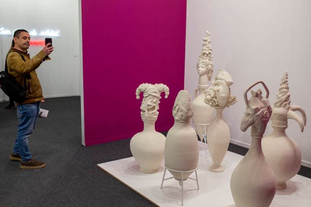 March 4, 2026, Madrid, Madrid, Spain: A visitor photographs a work of art with her cell phone during the opening of ARCO (Spain s International Contemporary Art Fair) at its 45th edition at the IFEMA exhibition center in Madrid. Madrid Spain - ZUMAs296 20260304_znp_s296_015 Copyright: xLuisxSotox