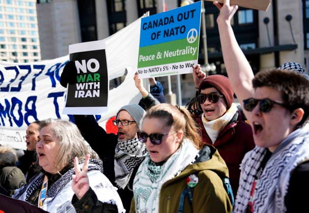 March 4, 2026, Ottawa, On, CAN: People rally against the United States and Israel s military strikes in Iran, outside the Ottawa Conference on Defence and Security in Ottawa, on Wednesday, March 4, 2026. Ottawa CAN  - ZUMAc35_ 20260304_zaf_c35_087 Copyright: xJustinxTangx