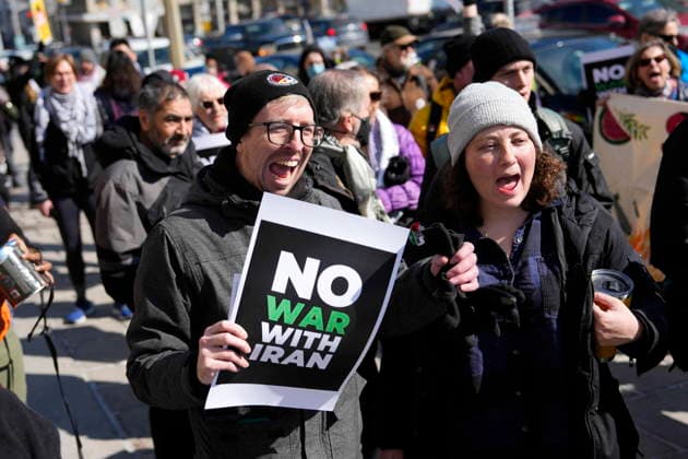 March 4, 2026, Ottawa, On, CAN: People rally against the United States and Israel s military strikes in Iran, outside the Ottawa Conference on Defence and Security in Ottawa, on Wednesday, March 4, 2026. Ottawa CAN  - ZUMAc35_ 20260304_zaf_c35_088 Copyright: xJustinxTangx