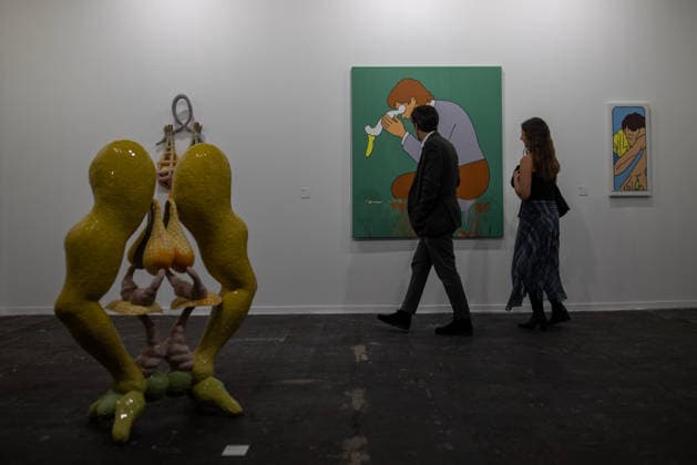 Opening of ARCO (Spain s International Contemporary Art Fair) in Madrid, Spain - 04 Mar 2026 A couple walks past an exhibited artwork during the opening of ARCO (Spain s International Contemporary Art Fair) at its 45th edition at the IFEMA exhibition center. Madrid Spain Copyright: xDavidxCanalesx xSOPAxImagesx DCARCO260304-18
