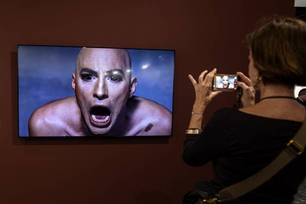 Opening of ARCO (Spain s International Contemporary Art Fair) in Madrid, Spain - 04 Mar 2026 A visitor seen photographing a work of art during the opening of ARCO (Spain s International Contemporary Art Fair) at its 45th edition at the IFEMA exhibition center. Madrid Spain Copyright: xDavidxCanalesx xSOPAxImagesx DCARCO260304-61
