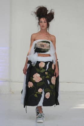 PFW - Reverie by Caroline Hu Runway A model walks the runway during the Reverie by Caroline Hu Womenswear Fall Winter 2026-2027 show as part of Paris Fashion Week on March 04, 2026 in Paris, France. Photo by Alain Gil Gonzalez ABACAPRESS.COM Paris France  Copyright: xGonzalezxAlain-Gil ABACAx