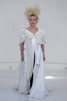 PFW - Reverie by Caroline Hu Runway A model walks the runway during the Reverie by Caroline Hu Womenswear Fall Winter 2026-2027 show as part of Paris Fashion Week on March 04, 2026 in Paris, France. Photo by Alain Gil Gonzalez ABACAPRESS.COM Paris France  Copyright: xGonzalezxAlain-Gil ABACAx