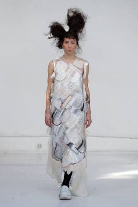 PFW - Reverie by Caroline Hu Runway A model walks the runway during the Reverie by Caroline Hu Womenswear Fall Winter 2026-2027 show as part of Paris Fashion Week on March 04, 2026 in Paris, France. Photo by Alain Gil Gonzalez ABACAPRESS.COM Paris France  Copyright: xGonzalezxAlain-Gil ABACAx