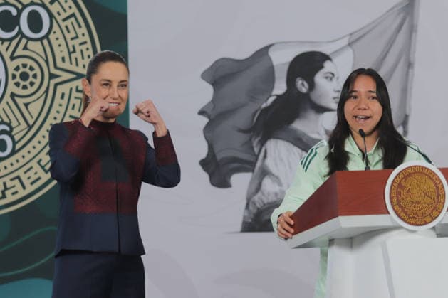 Mexico s President Claudia Sheinbaum is seen behind gesticulating as Charlyn Corral Ang, professional soccer player speaking during a briefing on the contest Represent Mexico at the Opening of the 2026 FIFA World Cup, through the so-called President s ticket at National Palace. on March 5, 2026 in Mexico City, Mexico. Mexico City Mexico - ZUMAe321 20260305_zia_e321_012 Copyright: xCarlosxSantiagox