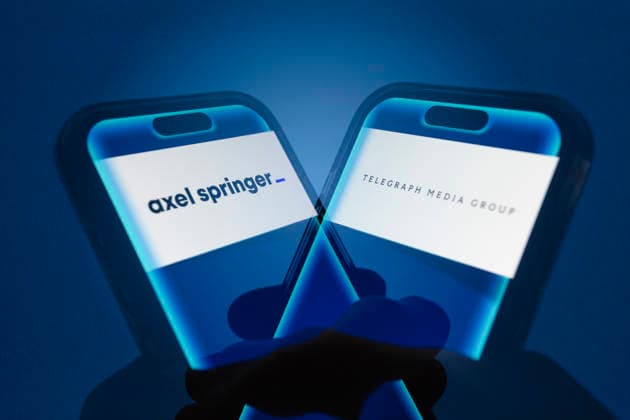 March 6, 2026, Taichung, Taiwan: A hand holds a smartphone displaying the logos of Axel Springer and Telegraph Media Group (TMG). Axel Springer has agreed to purchase the Telegraph Media Group. Taichung Taiwan  - ZUMAc217 20260306_zip_c217_001 Copyright: xAndrexM.xChangx
