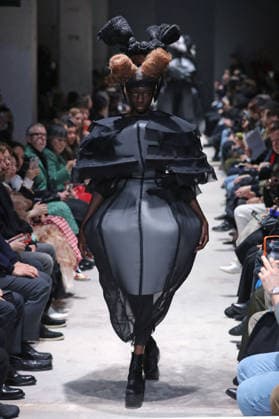 PFW - Comme Des Garcons Runway Models Walk Runway for the Comme des Garçons fashion show during Paris Fashion Week on March 7, 2026 in Paris, France. Photo by Alain-Gil Gonzalez ABACAPRESS.COM Paris France  Copyright: xGonzalezxAlain-Gil ABACAx