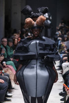 PFW - Comme Des Garcons Runway Models Walk Runway for the Comme des Garçons fashion show during Paris Fashion Week on March 7, 2026 in Paris, France. Photo by Alain-Gil Gonzalez ABACAPRESS.COM Paris France  Copyright: xGonzalezxAlain-Gil ABACAx