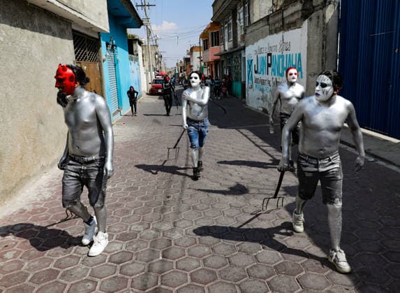 Traditional Xinacates Festival in San Nicolas de Los Ranchos Inhabitants of San Nicolas de los Ranchos whit their bodies panted walking on the streets during the traditional Xinacates festival, also known as the Festival of the Painted, where they perform dances as an offering for the start of the crops and to obtain a good harvest in the municipality of San Nicolas de los Ranchos located on the slopes of the Popocatepetl volcano. on March 8, 2026 in San Nicolas de Los Ranchos, Mexico. (Photo by Ian Robles Eyepix Group) Copyright: xIanxRobles xEyepixxGroupx EL_08032026_177757JPEG