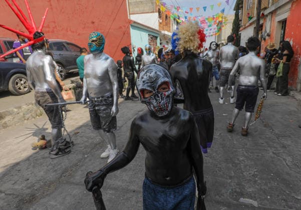 Traditional Xinacates Festival in San Nicolas de Los Ranchos A boy whit his body panted walking on the streets during the traditional Xinacates festival, also known as the Festival of the Painted, where they perform dances as an offering for the start of the crops and to obtain a good harvest in the municipality of San Nicolas de los Ranchos located on the slopes of the Popocatepetl volcano. on March 8, 2026 in San Nicolas de Los Ranchos, Mexico. (Photo by Ian Robles Eyepix Group) Copyright: xIanxRobles xEyepixxGroupx EL_08032026_177762JPEG