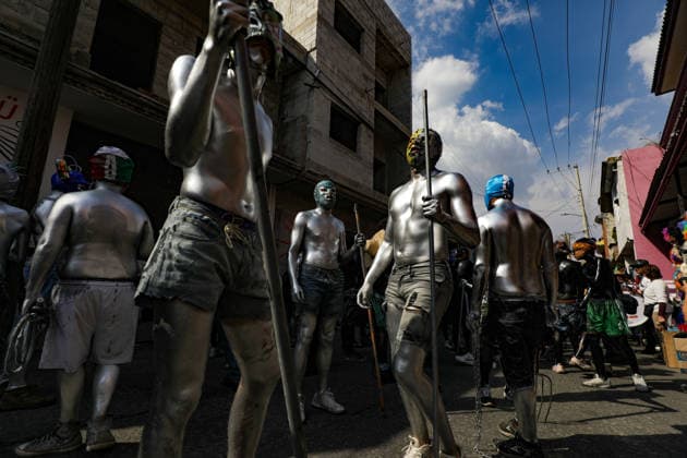 Traditional Xinacates Festival in San Nicolas de Los Ranchos Inhabitants of San Nicolas de los Ranchos whit their bodies panted walking on the streets during the traditional Xinacates festival, also known as the Festival of the Painted, where they perform dances as an offering for the start of the crops and to obtain a good harvest in the municipality of San Nicolas de los Ranchos located on the slopes of the Popocatepetl volcano. on March 8, 2026 in San Nicolas de Los Ranchos, Mexico. (Photo by Ian Robles Eyepix Group) Copyright: xIanxRobles xEyepixxGroupx EL_08032026_177769JPEG