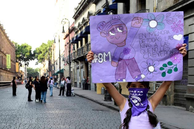 Protest For International Women s Day A girl holds a placard in a rally for International Women s Day at main square Zocalo. on March 8, 2026 in Mexico City, Mexico. (Photo by Luis Barron Eyepix Group) Copyright: xLuisxBarronx xEyepixxGroupx LB_08032026_177789
